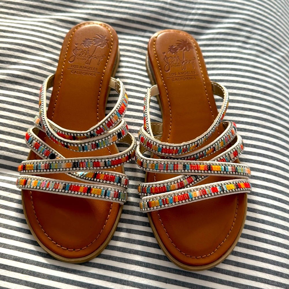 Brand new JellyPop flip flops. For a wedding but went with a heel instead.